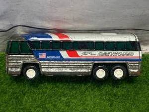 lot 13 image: 1979 Bodyshell Japanese Tin Greyhound Bus (Sold $35 on Ebay)