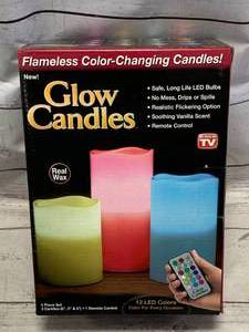 lot 23 image: New in Box Remote Control Glow Candles