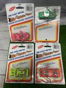 lot 32 image: Tak- A-Toy Set of Vintage Cars (Including Error Packaging)
