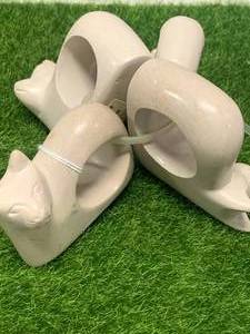 lot 70 image: Four Piece Soapstone Napkin Holders from Kenya