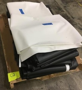 lot 200 image: Pallet of NEW Various-Sized Heavy Duty Tarps- 9 pieces. Total square footage 3,478 sq ft. Roughly 245 lbs. - Pallet C2
