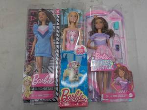 lot 107 image: 3 Barbie Dolls...