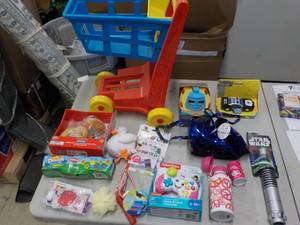 lot 135 image: Shopping Cart and Random Toys...
