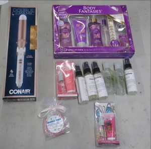 lot 142 image: Lotions, perfumes and Curling Iron...