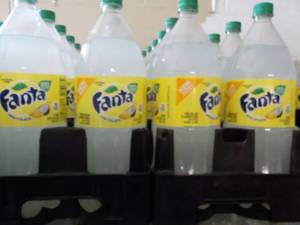 lot 246 image: 8 - 2 Liter Bottles Fanta Pina Cola...