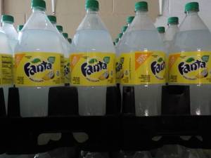 lot 247 image: 8 - 2 Liter Bottles Fanta Pina Cola...