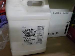 lot 274 image: 2 17.5 lb jugs Gold n Sweet liquid margarine