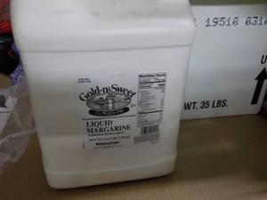 lot 275 image: 2 - 17.5lb Jugs Gold-n-Sweet Liguid...
