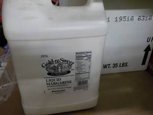 lot 276 image: 2 - 17.5lb Jugs Gold-n-Sweet Liguid...