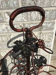 lot 57 image: Metal Grape Vine Themed Wine Rack