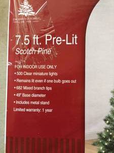 lot 55 image: 7.5 Foot Scotch Pine Pre-Lit Christmas Tree With Stand