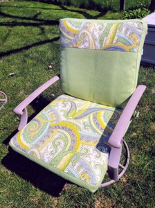 lot 7 image: Glass Topped Patio Table and Custom Upholstered Cushions