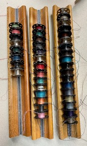 lot 212 image: Magnetic Bobbin Holders and Zippers