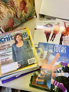 lot 235 image: Magazine Rack with Knitting Magazines and Pamphlets