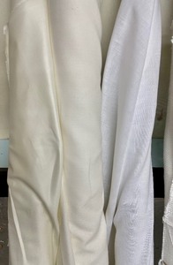 lot 294 image: Bolts of White Fabrics and Vinyl