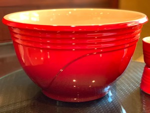 lot 137 image: LeCreuset  Large Bowl and Four Custard Dishes in Bright Red