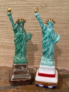 lot 173 image: Two Limoges Statue of Liberty Figurines