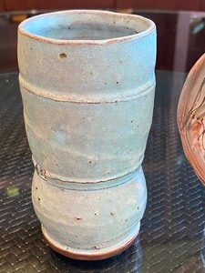 lot 143 image: Two Pottery Items Tumbler and Decorative Trivet