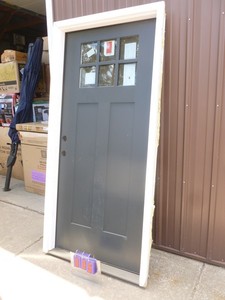Prehung Entry door with 6 pane glass. 36 Looks like it was installed & then removed. As shown.