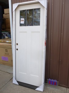 3 pane prehung entry door. 32 Appears to have been a store display. As shown.