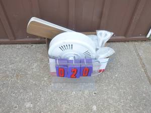 White ceiling fan. New in box. Box appears to have been damaged in shipment. As shown.