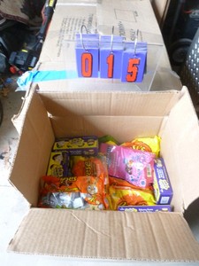 Approx 40lb of assorted candy. Some may be out of date. As shown.