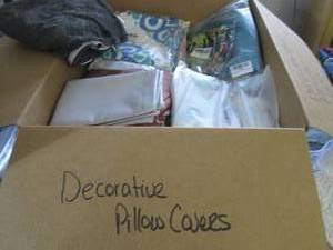 lot 1 image: Box of Assorted Pillow Covers & Sha...