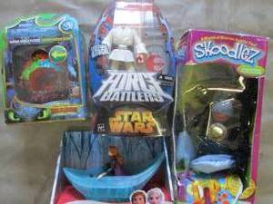 lot 184 image: 4 Assorted Toys...