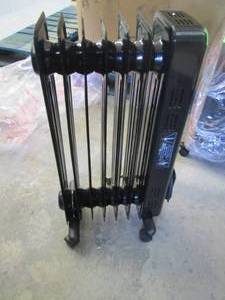 lot 244 image: New Oil Filled Heater- tested ZZ1...