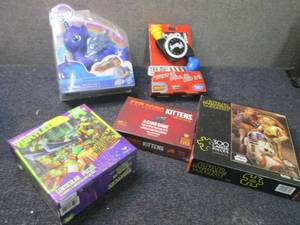 lot 309 image: Puzzles & Toys...