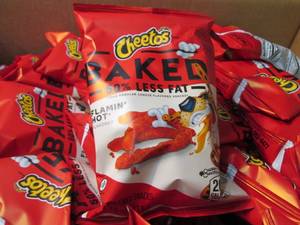 lot 345 image: Case of 64- 1.5 oz bags Flaming Hot...