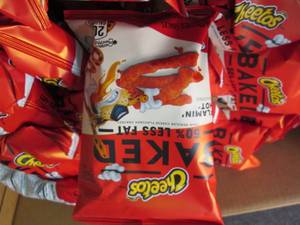 lot 348 image: Case of 64- 1.5 oz bags Flaming Hot...