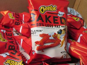 lot 350 image: Case of 64- 1.5 oz bags Flaming Hot...