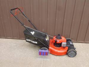 Craftsman self propelled mower with bag. Looks new. Tested & works. As shown.
