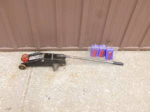 Small hydraulic floor jack. Tested & works. As shown.