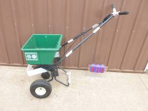 Lesco spreader. Missing one wheel. Otherwise appears new. As shown.
