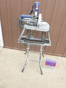 Kobalt tile saw with stand. Tested & works. As shown.