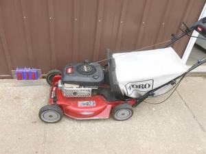 Toro personal pace lawn mower with bag. Tested & works. As shown.