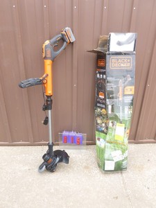 Black & Decker 20 volt lion weed trimmer with battery & charger. Tested & works. As shown.