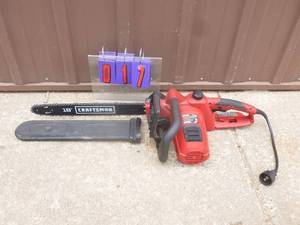 Craftsman electric chainsaw. Looks new. Tested & works. As shown.