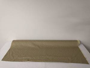 1 Roll Of Sage Colored Patterned Fabric