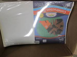 box of construction paper , pens an...