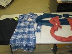 lot of womens clothes and scarfs ...