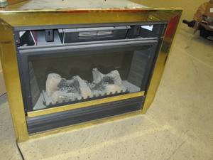 electric fireplace insert powers on...