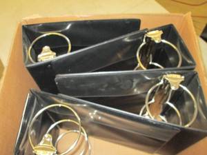 4 black 3 ring binders ...