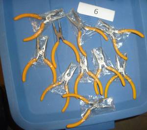 ten small needle nose pliers
