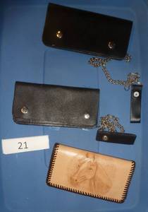 3 Mens wallets, 2 truckersbikers with chain, and one hand tooled leather with horse head