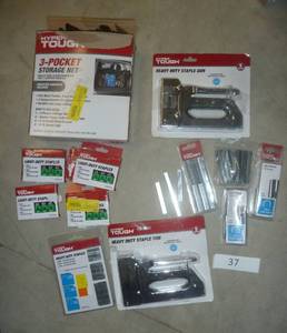 lot of staple guns (untested), bunch of staples, storage net