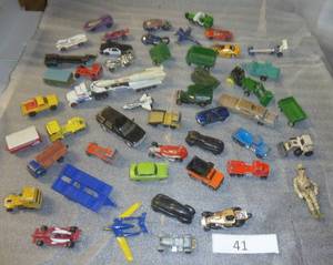 bunch of matchbox cars, a few unusual ones, space shuttle, Nasa truck with rocket, stretch limo