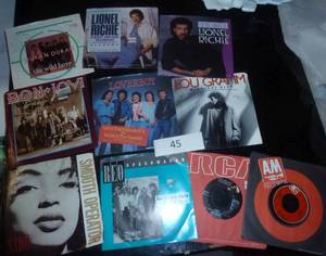 group of 45 RPM records - Lionel Richie, Bon Jovi, Loverboy, REO etc from the 80s
